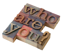 Woodcut blocks with the words "who are you?"