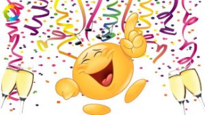 Cartoon of a happy, dancing, laughing emoji with a background of confetti and champagne glasses.